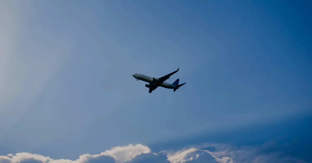 plane in sky blue sky
